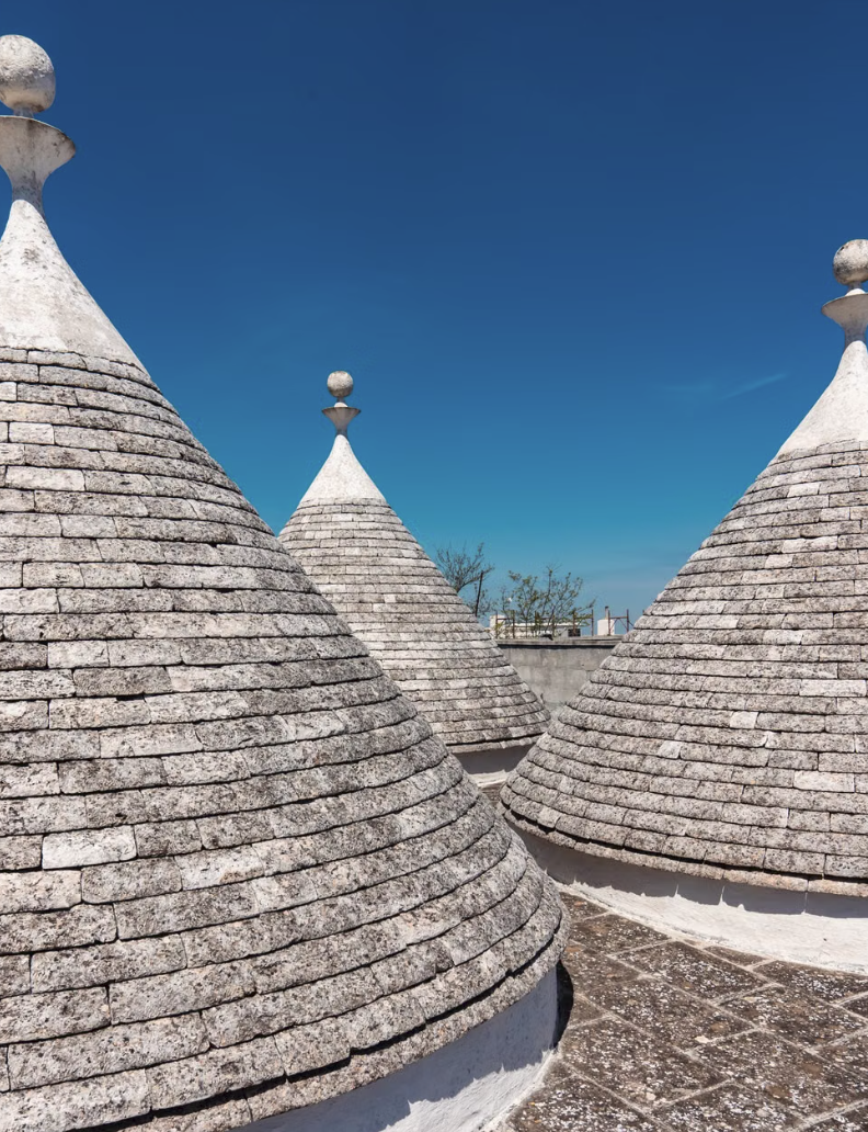 a image of 3 trulli's in puglia